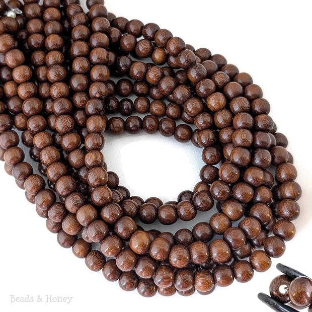 Madre de Cacao Wood Dark Large Hole Round 8.5mm (16-Inch Strand)