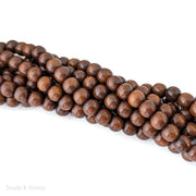 Madre de Cacao Wood Dark Large Hole Round 8.5mm (16-Inch Strand)