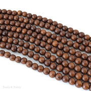 Madre de Cacao Wood Dark Large Hole Round 8.5mm (16-Inch Strand)