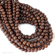 Madre de Cacao Wood Dark Large Hole Round 8.5mm (16-Inch Strand)