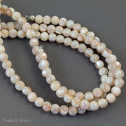 White Troca Shell Beads with Pink Shell Inlay Round 5-6mm (8-Inch Strand)