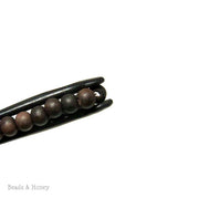 Unfinished Ebony Wood Beads Round 6mm - 7mm (16 Inch Strand) Unfinished Ebony Wood Beads Round 6mm - 7mm (16-Inch Strand)