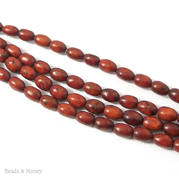 Dyed Magnesite Rust Rice/Barrel 8x6mm (16 Inch Strand)