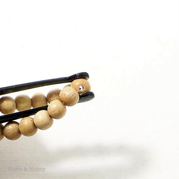 Meranti Wood Bead Light Round 4mm (16 Inch Strand)