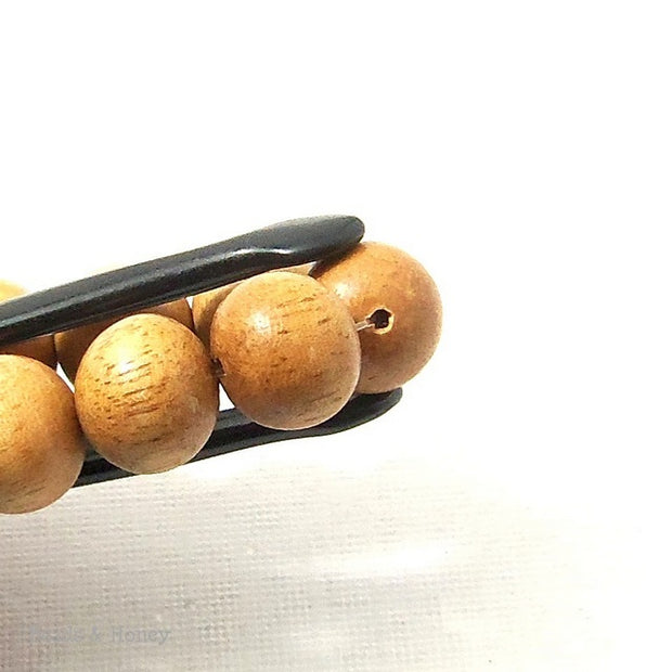 Meranti Wood Bead Light Round 12mm (16 Inch Strand)